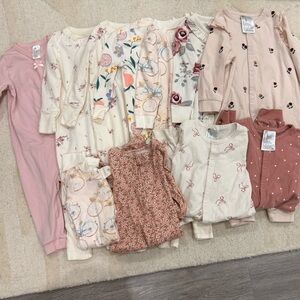 11 never worn! Assorted Baby sleepers in Pink and Cream
